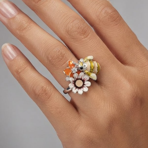 925 Sterling Silver 9.75 Grams Bee with Flower Enamel Nice Design: Product ID: 200107443 Product Name: Natural Fashion Jewelry Weight: 9.75 CT. Size: 22 x 18 Mm. MM. Shape: Round Color: Multi Color Clarity:None Luster: Good Gems Origin: Thailand Treatment: None Cryst