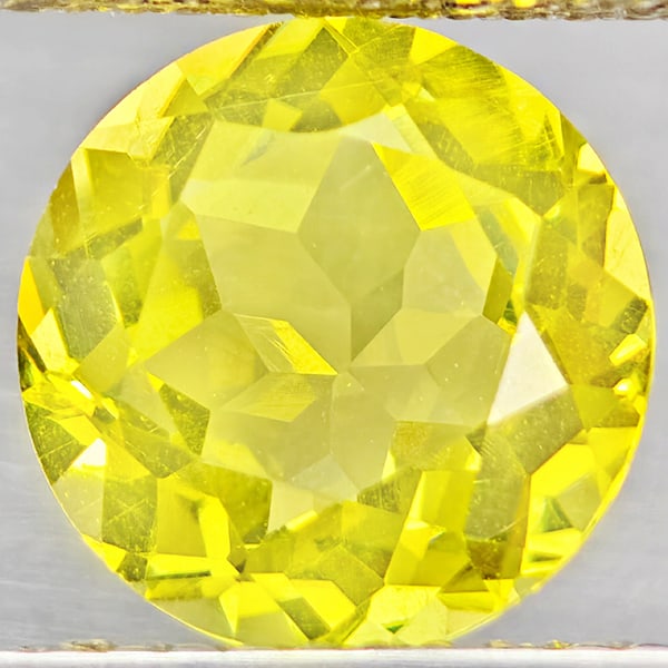 Natural Yellow Lemon Quartz Gemstones 2.63 Ct. Round Shape 9.1 Mm.: Product ID: 805530211 Product Name: Natural Quartz Weight: 2.63 CT. Size: 9.1 x 9.1 x 5.8 MM. Shape: Round Color: Yellow Lemon Clarity:VSI Luster: Good Gems Origin: Brazil Treatment: Unheated Crystal 