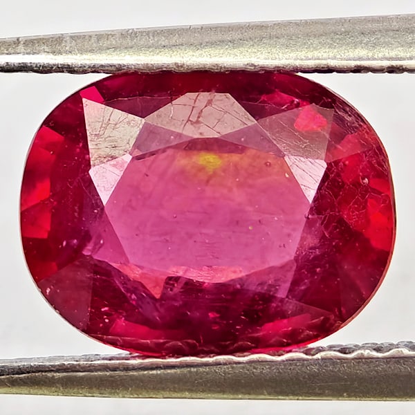 Natural Purplish Red Ruby Gemstones 2.47 Ct. Oval Shape 9.2 x 7.3 Mm.: Product ID: 805935682 Product Name: Natural Ruby Weight: 2.47 CT. Size: 9.2 x 7.3 x 3.9 MM. Shape: Oval Color: Purplish Red Clarity:VSI Luster: Good Gems Origin: Madagascar Treatment: Heated (Lead-gla