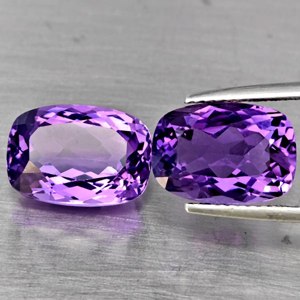 Natural Purple Amethyst Gemstones 8.41 Ct. 2 Pcs Cushion Shape 12.2 x 8.6 Mm.: Product ID: 800325617 Product Name: Natural Amethyst Weight: 8.41 CT. Size: 12.2 x 8.6 x 6.7 MM. Shape: Cushion Shape Color: Purple Clarity:VSI Luster: Good Gems Origin: Brazil Treatment: Unheated Cry