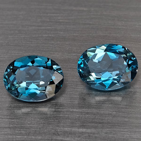 Natural London Blue Topaz Gemstones 4.26 Ct. 2 Pcs Oval Shape 9 x 7.3 Mm.: Product ID: 807168941 Product Name: Natural Blue Topaz Weight: 4.26 CT. Size: 9 x 7 x 4.5 MM. Shape: Oval Color: London Blue Clarity:SI1 Luster: Good Gems Origin: Brazil Treatment: Treated Crystal Str
