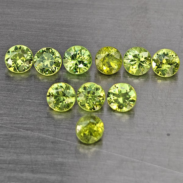 Natural Green Demantiod Garnet Gemstones 1.44 Ct. 10 Pcs. Round Diamond Cut 3.3 Mm.: Product ID: 802937710 Product Name: Natural Demantoid Weight: 1.44 CT. Size: 3.3 x 3.3 x 2.3 MM. Shape: Round Diamond Cut Color: Green Clarity:SI1 Luster: Good Gems Origin: Madagascar Treatment: Unhea