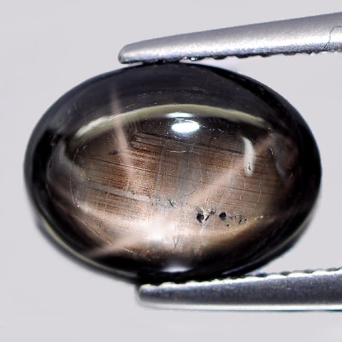 Natural Black Star Sapphire Gemstones 6 Rays 3.54 Ct. Oval Cabochon Shape 11 x 8.1 Mm.: Product ID: 806132907 Product Name: Natural Star Sapphire Weight: 3.54 CT. Size: 11 x 8.1 x 3.7 MM. Shape: Oval Cabochon Color: Black Clarity:Opaque Luster: Good 6 Rays Star Gems Origin: Thailand Trea