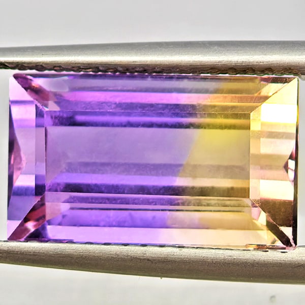 Natural Bi Color Ametrine Gemstones 6.02 Ct. Baguette Shape 13.6 x 8.1 Mm.: Product ID: 800408564 Product Name: Natural Ametrine Weight: 6.02 CT. Size: 13.6 x 8.1 x 7 MM. Shape: Baguette Color: Bi Color Clarity:VSI Luster: Good Gems Origin: Bolivia Treatment: Unheated Crystal