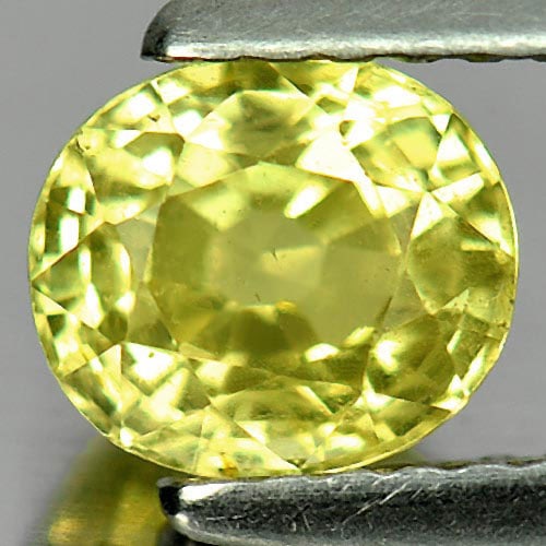 Natural Chrysoberyl Greenish Yellow Gemstones 1.23 Ct. Oval Shape 6.3 x 5.5 Mm.: Product ID: 801701113 Product Name: Natural Chrysoberyl Weight: 1.23 CT. Size: 6.3 x 5.5 x 4.2 MM. Shape: Oval Color: Greenish Yellow Clarity:VSI Luster: Very Good Gems Origin: Madagascar Treatment: U