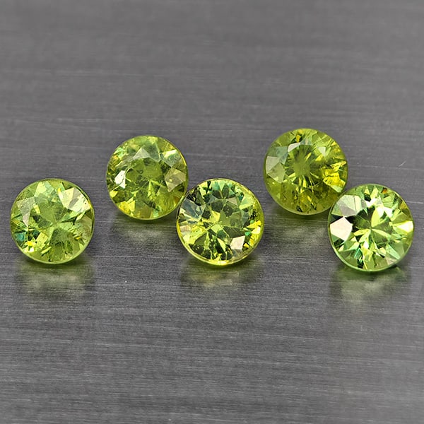 Natural Green Demantiod Garnet Gemstones 1.00 Ct. 5 Pcs. Round Diamond Cut 3.3 Mm.: Product ID: 802937635 Product Name: Natural Demantoid Weight: 1.00 CT. Size: 3.3 x 3.3 x 2.4 MM. Shape: Round Diamond Cut Color: Green Clarity:SI1 Luster: Good Gems Origin: Madagascar Treatment: Unhea