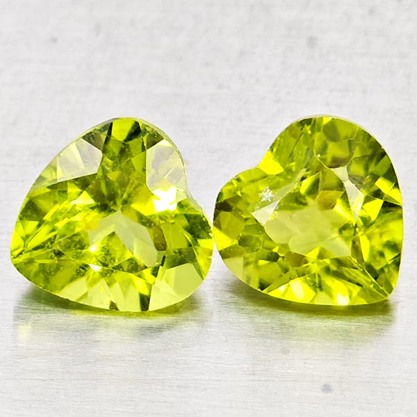 Natural Green Peridot Gemstones 1.89 Ct. 2 Pcs. Heart Shape 6 x 6 Mm.: Product ID: 805317333 Product Name: Natural Peridot Weight: 1.89 CT. Size: 6 x 6 x 4 MM. Shape: Heart Shape Color: Green Clarity:VSI - SI1 Luster: Good Gems Origin: Pakistan Treatment: Unheated Crysta