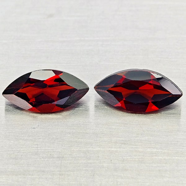 Natural Orangish Red Garnet Gemstones 2.68 Ct. 2 Pcs. Marquise Shape 5.x 10.1 Mm.: Product ID: 802937022 Product Name: Natural Garnet Weight: 2.68 CT. Size: 5 x 10.1 x 3.4 MM. Shape: Marquise Shape Color: Orangish Red Clarity:VVS - VSI Luster: Good Gems Origin: Tanzania Treatment: U