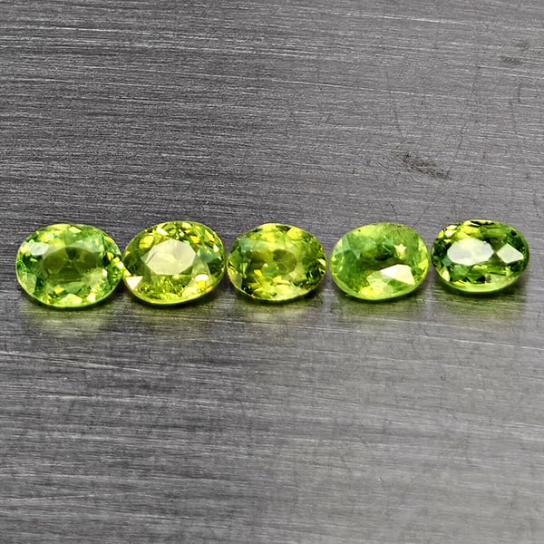 Natural Green Demantiod Garnet Gemstones 1.35 Ct. 5 Pcs. Oval Shape 4.2 x 3.8 Mm.: Product ID: 802937563 Product Name: Natural Demantoid Weight: 1.35 CT. Size: 4.2 x 3.8 x 2.4 MM. Shape: Oval Color: Green Clarity:SI1 Luster: Good Gems Origin: Madagascar Treatment: Unheated Crystal S
