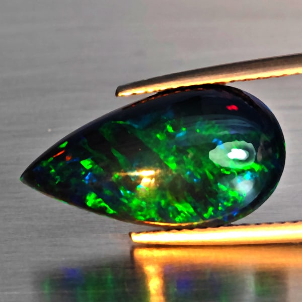 Natural Multi Color Play Of Color Rainbow Opal Gemstones 3.29 Ct. Pear Cabochon Shape 18.7 x 10 Mm.: Product ID: 818728645 Product Name: Natural Opal Weight: 3.29 CT. Size: 18.7 x 10 x 4.6 MM. Shape: Pear Cabochon Color: Multi-Color Clarity:Semi - Transparent Luster: Good Gems Origin: Ethiopia Treatm