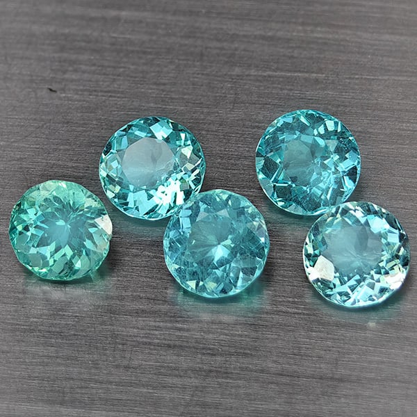 Natural Paraiba Color Apatite Gemstones 2.30 Ct. 5 Pcs. Round Shape 4.8 Mm.: Product ID: 800613741 Product Name: Natural Apatite Weight: 2.30 CT. Size: 4.8 x 4.8 x 3.6 MM. Shape: Round Color: Paraiba Color Clarity:SI1 Luster: Good Gems Origin: Tanzania Treatment: Unheated Crys