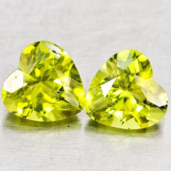 Natural Green Peridot Gemstones 1.75 Ct. 2 Pcs. Heart Shape 6.2 x 6.2 Mm.: Product ID: 805317292 Product Name: Natural Peridot Weight: 1.75 CT. Size: 6.2 x 6.2 x 4 MM. Shape: Heart Shape Color: Green Clarity:VSI - SI1 Luster: Good Gems Origin: Pakistan Treatment: Unheated Cr
