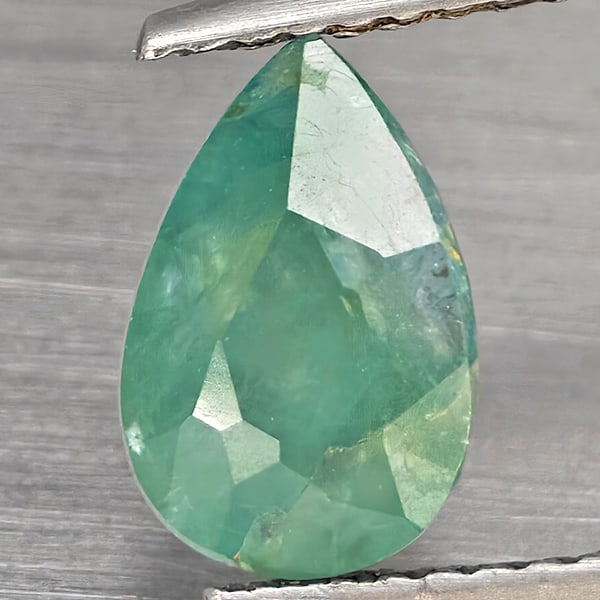 Natural Green Blueish Grandidierite Gemstones 1.92 Ct. Pear Shape 9.2 x 6.3 Mm.: Product ID: 803100125 Product Name: Natural Tsavorite Weight: 1.92 CT. Size: 9.2 x 6.3 x 5.4 MM. Shape: Pear Color: Green Blueish Clarity:SI1 Luster: Good Gems Origin: Madagascar Treatment: Unheated C