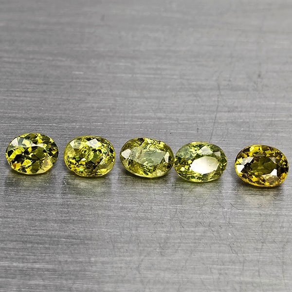 Natural Green Demantiod Garnet Gemstones 1.25 Ct. 5 Pcs. Oval Shape 4.3 x 3.2 Mm.: Product ID: 802937595 Product Name: Natural Demantoid Weight: 1.25 CT. Size: 4.3 x 3.2 x 2.3 MM. Shape: Oval Shape Color: Green Clarity:SI1 Luster: Good Gems Origin: Madagascar Treatment: Unheated Cry