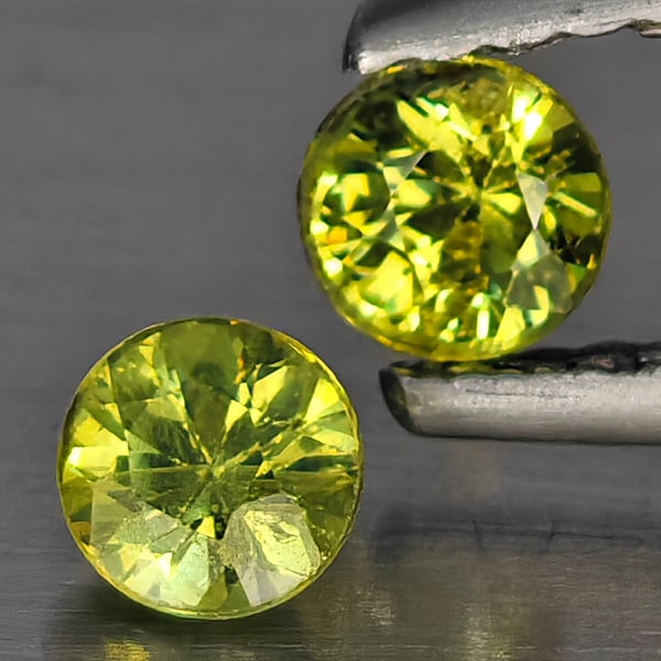 Natural Green Demantiod Garnet Gemstones 0.40 Ct. 2 Pcs. Round Diamond Cut 3.5 Mm.: Product ID: 802937774 Product Name: Natural Demantoid Weight: 0.40 CT. Size: 3.5 x 3.5 x 2.6 MM. Shape: Round Diamond Cut Color: Green Clarity:SI1 Luster: Good Gems Origin: Madagascar Treatment: Unhea