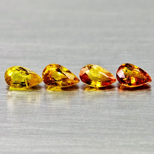 Natural Yellow Songea Sapphire Gemstones 1.19 Ct. 4 Pcs. Pear Shape 5 x 3.1 Mm.: Product ID: 806162308 Product Name: Natural Orange Sapphire Weight: 1.19 CT. Size: 5 x 3.1 x 2.6 to 4.9 x 2.9 x 2.1 MM. Shape: Pear Shape Color: Yellow Clarity:VSI - SI1 Luster: Good Gems Origin: Tanz