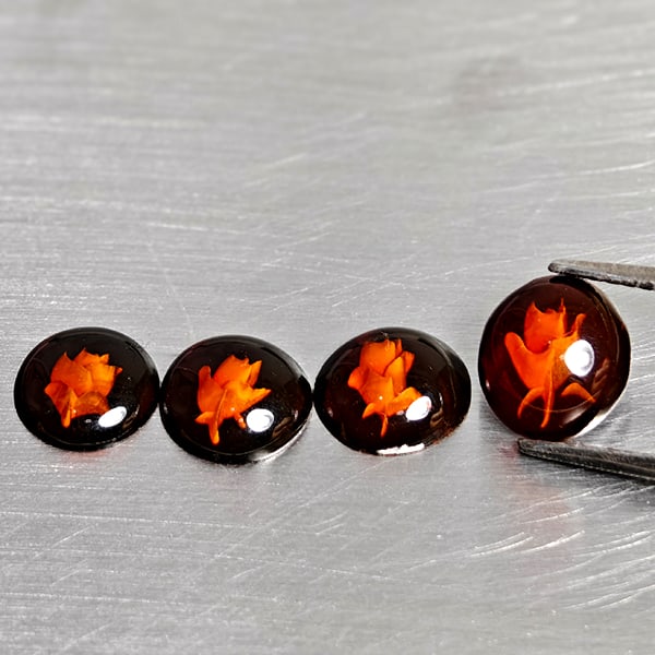 Natural Brown Yellow Amber 1.55 Ct. 4 Pcs. Flower Carving In Mixed Shape Cabochon and Mixed Size: Product ID: 819091048 Product Name: Natural Amber Weight: 1.55 CT. Size: 8.2 x 7.6 x 3 to 7.4 x 7.4 x 1.9 MM. Shape: Mixed Shape Cabochon Color: Brown Yellow Clarity:Semi - Transparent Luster: Good Ge