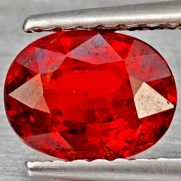 Natural Orangish Red Spessartine Garnet Gemstones 1.33 Ct. Oval Shape 7.1 x 5.4 Mm.: Product ID: 802937185 Product Name: Natural Garnet Weight: 1.33 CT. Size: 7.1 x 5.4 x 3.7 MM. Shape: Oval Shape Color: Orangish Red Clarity:SI1 Luster: Good Gems Origin: Namibia Treatment: Unheated Cr
