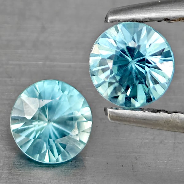 Natural Blue Zircon Gemstones 1.07 Ct. 2 Pcs. Round Diamond Cut 4.7 Mm.: Product ID: 807743262 Product Name: Natural Gemstones Weight: 1.07 CT. Size: 4.7 x 4.7 x 3 MM. Shape: Round Diamond Cut Color: Blue Clarity:SI1 Luster: Good Gems Origin: Cambodia Treatment: Heated Cry