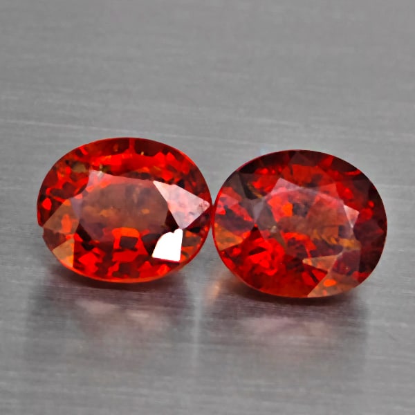 Natural Orangish Red Spessartine Garnet Gemstones 2.88 Ct. 2 Pcs. Oval Shape 7 x 6 Mm.: Product ID: 802937979 Product Name: Natural Garnet Weight: 2.88 CT. Size: 7 x 6 x 4.4 MM. Shape: Oval Color: Orangish Red Clarity:SI1 Luster: Good Gems Origin: Namibia Treatment: Unheated Crystal Stru