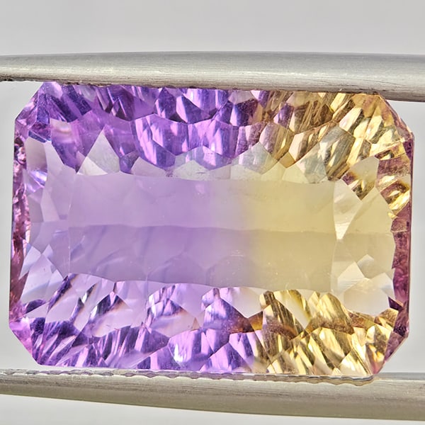 Natural Bi Color Ametrine Gemstones 9.82 Ct. Octagon Concave Cut 16 x 11.4 Mm.: Product ID: 800408544 Product Name: Natural Ametrine Weight: 9.82 CT. Size: 16 x 11.4 x 7 MM. Shape: Octagon Concave Cut Color: Bi Color Clarity:VVS - VSI Luster: Very Good Gems Origin: Bolivia Treatm