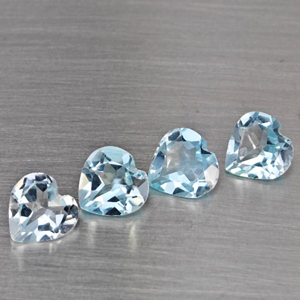 Natural Baby Blue Topaz Gemstones 3.13 Ct. 4 Pcs Heart Shape 6.2 Mm.: Product ID: 807168977 Product Name: Natural Blue Topaz Weight: 3.13 CT. Size: 6.2 x 6.2 x 3.8 MM. Shape: Heart Shape Color: Baby Blue Clarity:SI1 Luster: Good Gems Origin: Brazil Treatment: Treated Cr