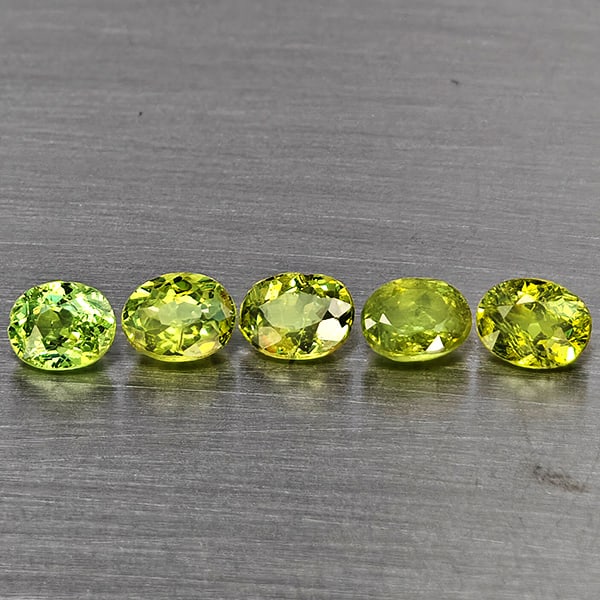 Natural Green Demantiod Garnet Gemstones 1.25 Ct. 5 Pcs. Oval Shape 4.4 x 3.3 Mm.: Product ID: 802937561 Product Name: Natural Demantoid Weight: 1.25 CT. Size: 4.4 x 3.3 x 2.2 MM. Shape: Oval Color: Green Clarity:SI1 Luster: Good Gems Origin: Madagascar Treatment: Unheated Crystal S