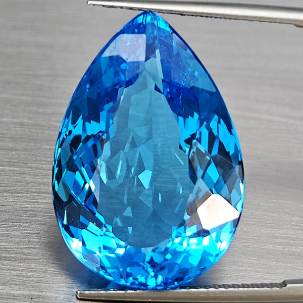 Natural Swiss Blue Topaz Gemstones 37.61 Ct. Pear Shape 25 x 17.2 Mm: Product ID: 807168693 Product Name: Natural Blue Topaz Weight: 37.61 CT. Size: 25 x 17.2 x 11.2 MM. Shape: Pear Shape Color: Swiss Blue Clarity:VVS Luster: Good Gems Origin: Brazil Treatment: Treated 