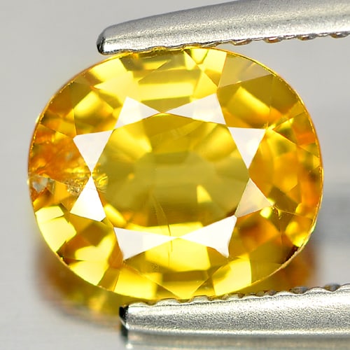 Natural Yellow Sapphire Gemstones 1.60 Ct. Oval Shape 7.6 x 6.6 Mm.: Product ID: 806151586 Product Name: Natural Yellow Sapphire Weight: 1.60 CT. Size: 7.6 x 6.6 x 3.6 MM. Shape: Oval Color: Yellow Clarity:SI Luster: Very Good Gems Origin: Thailand Treatment: Heated Cr