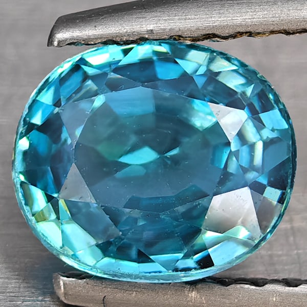 Natural Blue Zircon Gemstones 2.04Ct. Oval Shape 7.4 x 6.3 Mm.: Product ID: 807743084 Product Name: Natural Zircon Weight: 2.04 CT. Size: 7.4 x 6.3 x 4 MM. Shape: Oval Shape Color: Blue Clarity:VSI Luster: Good Gems Origin: Cambodia Treatment: Heated Crystal Struc