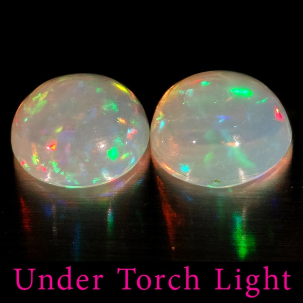 Natural Multi Color Opal Gemstones 1.50 Ct. 2 Pcs. Round Cabochon Shape 7 Mm.: Product ID: 818728181 Product Name: Natural Opal Weight: 1.50 CT. Size: 7 x 7 x 3.5 MM. Shape: Round Cabochon Color: Multi-Color Clarity:Semi - Transparent Luster: Good Gems Origin: Ethiopia Treatment