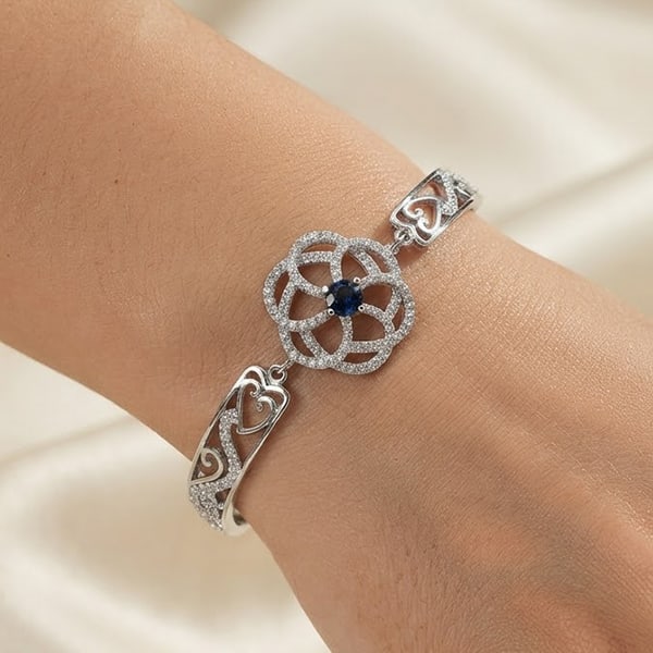 925 Sterling Silver Bangle Jewelry 12.87 Grams Diameter 50 Mm.: Product ID: 280550010 Product Type: 925 Sterling Silver Fine Jewelry Jewelry Weight: 12.87 Grams. Gemstones Color: Blue Metal: Solid Silver 92.5%. Gemstone Detail: Round Blue CZ Size 5 x 5 Mm. 1 Pc. A