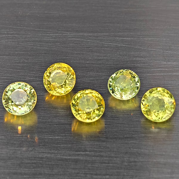 Natural Greenish Yellow Sphene Gemstones Rainbow Spark 1.92 Ct. 5 Pcs Round Shape 4.2 Mm.: Product ID: 806509381 Product Name: Natural Sphene Weight: 1.92 CT. Size: 4.2 x 4.2 x 2.8 MM. Shape: Round Color: Greenish Yellow Clarity:SI1 Luster: Good Gems Origin: Madagascar Treatment: Unheated C
