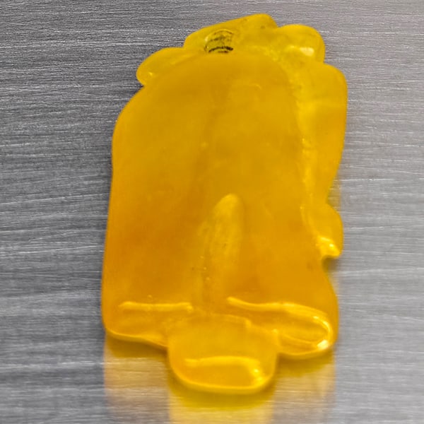 Natural Honey Jade Gemstones 15.68 Ct. Carving Shape 24 x 12.3 Mm.: Product ID: 819816341 Product Name: Natural Gemstones Weight: 15.68 CT. Size: 24 x 12.3 x 6.4 MM. Shape: Carving Shape Color: Mixed Color Yellow Clarity:None Luster: None Gems Origin: Thailand Treatme
