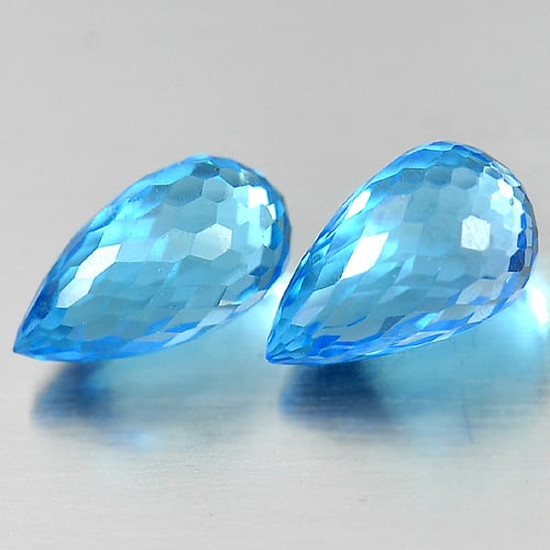 Natural Blue Topaz Gemstones 4.22 Ct. Briolette Shape 9.2 x 5.1 Mm.: Product ID: 807151360 Product Name: Natural Blue Topaz Weight: 4.22 CT. Size: 9.2 x 5.1 x 5.1 MM. Shape: Briolette Color: Blue Clarity:VSI Luster: Good Gems Origin: Brazil Treatment: Treated Crystal S