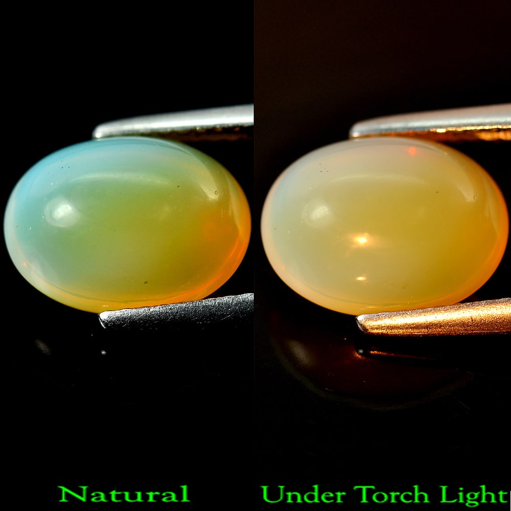 Natural Multi Color Opal Gemstones 2.86 Ct. Oval Cabochon Shape 11.3 x 8.6 Mm.: Product ID: 818708347 Product Name: Natural Opal Weight: 2.86 CT. Size: 11.3 x 8.6 x 6.4 MM. Shape: Oval Cabochon Color: Multi Color Clarity:Opaque Luster: Good Gems Origin: Ethiopia Treatment: Unheat