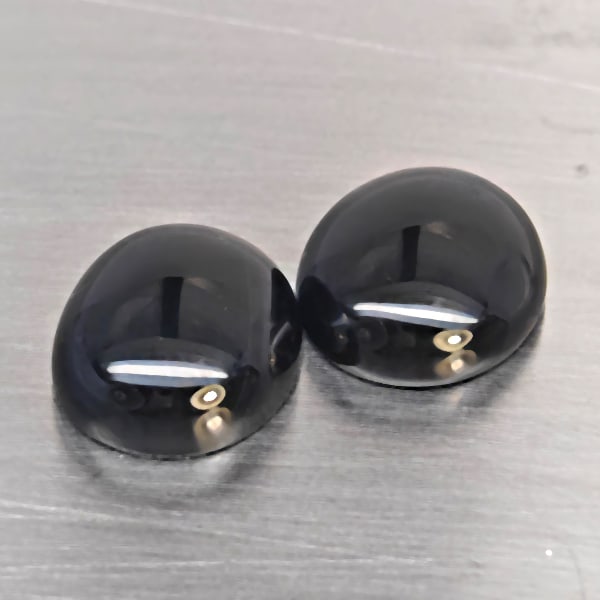 Natural Black Spinel Gemstones 8.60 Ct. 2 Pcs. Oval Cabochon Shape and Mixed Size: Product ID: 806609933 Product Name: Natural Spinel Weight: 8.60 CT. Size: 12.1 x 10 x 5 to 12 x 16.3 x 4.6 MM. Shape: Oval Cabochon Color: Black Clarity:Opaque Luster: None Gems Origin: Thailand Treat