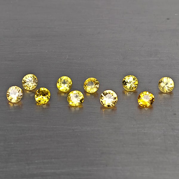 Natural Yellow Songea Sapphire Gemstones 1.28 Ct. 10 Pcs. Round Shape 2.4 Mm.: Product ID: 806130663 Product Name: Natural Yellow Sapphire Weight: 1.28 CT. Size: 2.4 x 2.4 x 1.5 MM. Shape: Round Shape Color: Yellow Clarity:VSI Luster: Good Gems Origin: Tanzania Treatment: Heated