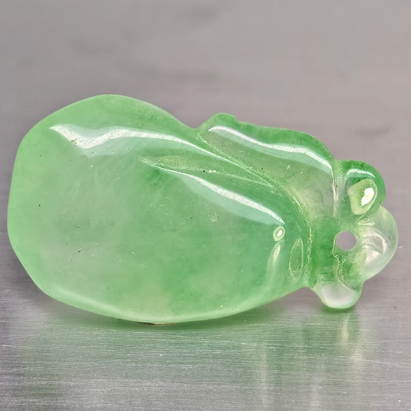 Natural Green Jade Gemstones 13.54 Ct. Carving Shape 22 x 13 Mm.: Product ID: 819816339 Product Name: Natural Gemstones Weight: 13.54 CT. Size: 22 x 13 x 7.4 MM. Shape: Carving Shape Color: Mixed Color Green Clarity:None Luster: None Gems Origin: Thailand Treatment: