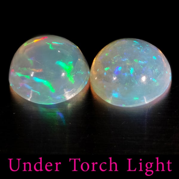 Natural Multi Color Opal Gemstones 1.46 Ct. 2 Pcs. Round Cabochon Shape 7 Mm.: Product ID: 818728194 Product Name: Natural Opal Weight: 1.46 CT. Size: 7 x 7 x 3.5 MM. Shape: Round Cabochon Color: Multi-Color Clarity:Semi - Transparent Luster: Good Gems Origin: Ethiopia Treatment