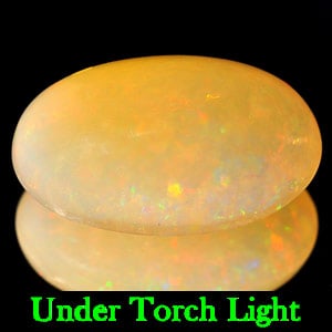 Natural Multi Color Opal Gemstones 5.90 Ct. Oval Cabochon Shape 16.2 x 10.5 Mm.: Product ID: 818707996 Product Name: Natural Opal Weight: 5.90 CT. Size: 16.2 x 10.5 x 7.2 MM. Shape: Oval Cabochon Color: Multi Color Clarity:Semi - Transparent Luster: Good Gems Origin: Ethiopia Trea