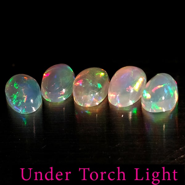 Natural Multi Color Opal Gemstones 1.48 Ct. 5 Pcs. Oval Cabochon Shape 6.1 x 4.2 Mm.: Product ID: 818728132 Product Name: Natural Opal Weight: 1.48 CT. Size: 6.1 x 4.2 x 2.3 MM. Shape: Oval Cabochon Color: Multi-Color Clarity:Semi - Transparent Luster: Good Gems Origin: Ethiopia Treatm