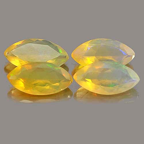 Natural Multi Color Opal Gemstones 2.26 Ct. 4 Pcs. Marquise Shape 9.9 x 5 Mm.: Product ID: 818725388 Product Name: Natural Opal Weight: 2.26 CT. Size: 9.9 x 5 x 3.2 MM. Shape: Marquise Color: Multi-Color Clarity:Semi - Transparent Luster: Iridescent Gems Origin: Ethiopia Treatme