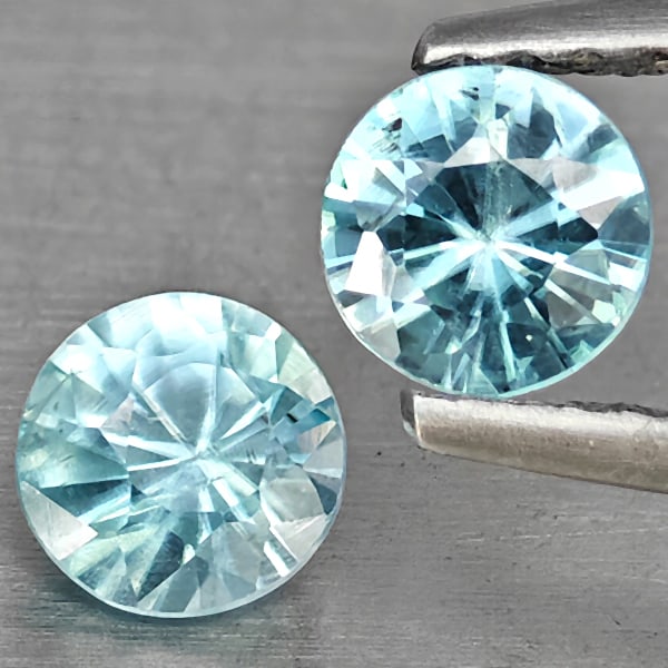 Natural Blue Zircon Gemstones 0.95 Ct. 2 Pcs. Round Diamond Cut 4.6 Mm.: Product ID: 807743269 Product Name: Natural Gemstones Weight: 0.95 CT. Size: 4.6 x 4.6 x 3.1 MM. Shape: Round Diamond Cut Color: Blue Clarity:VSI Luster: Very Good Gems Origin: Cambodia Treatment: Hea