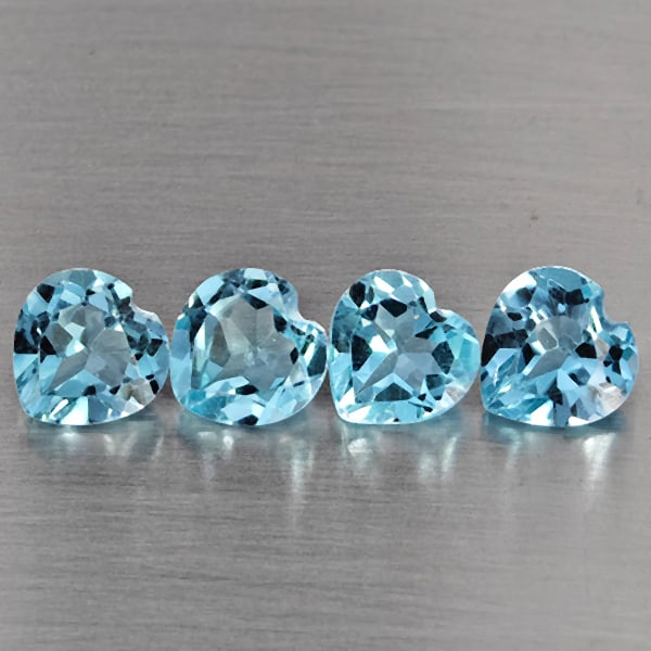 Natural Baby Blue Topaz Gemstones 2.94 Ct. 4 Pcs. Heart Shape 6.2 Mm.: Product ID: 807168978 Product Name: Natural Blue Topaz Weight: 2.94 CT. Size: 6.2 x 6.2 x 3 MM. Shape: Heart Shape Color: Baby Blue Clarity:SI1 Luster: Good Gems Origin: Brazil Treatment: Treated Crys