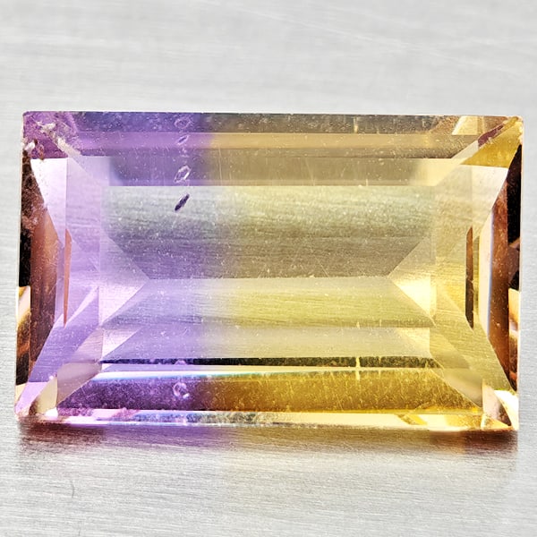 Natural Bi Color Ametrine Gemstones 2.34 Ct. Baguette Shape 10.6 x 6.7 Mm.: Product ID: 800408518 Product Name: Natural Ametrine Weight: 2.34 CT. Size: 10.6 x 6.7 x 4.1 MM. Shape: Baguette Color: Bi Color Clarity:VSI Luster: Good Gems Origin: Bolivia Treatment: Unheated Cryst