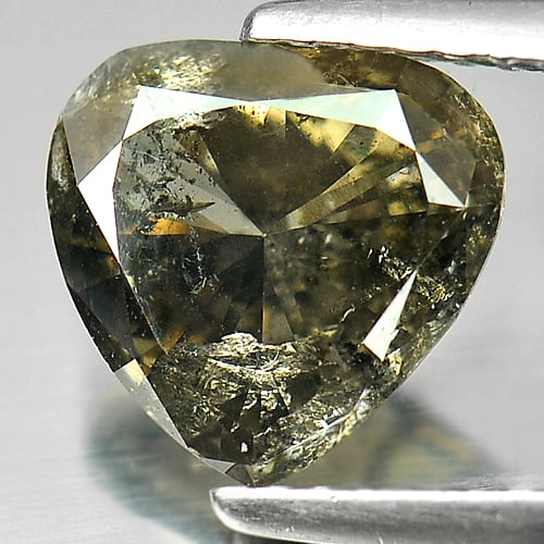 Natural Greenish Smoky Diamond 1.72 Ct. Fancy Shape 9 x 8.7 Mm.: Product ID: 102100117 Product Name: Natural Natural Diamond Weight: 1.72 CT. Size: 9 X 8.7 X 3.5 MM. Shape: Fancy Color: Greenish Smoky Clarity:SI Luster: Good Gems Origin: Belgium Treatment: Unheated