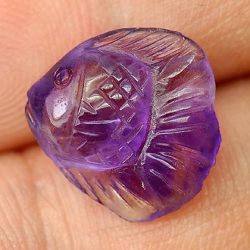 Natural Purple Amethyst Gemstones 3.93 Ct. Fish Carving Shape 12.6 x 12.4 Mm.: Product ID: 810303983 Product Name: Natural Amethyst Weight: 3.93 CT. Size: 12.6 x 12.4 x 5.4 MM. Shape: Fish Carving Color: Purple Clarity:Semi - Transparent Luster: Good Gems Origin: Brazil Treatmen
