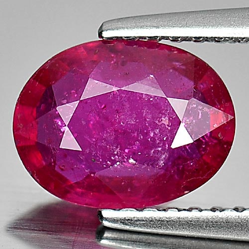 Natural Purplish Red Ruby Gemstones 1.50 Ct. Oval Shape 8.5 x 6.5 Mm.: Product ID: 805920569 Product Name: Natural Ruby Weight: 1.50 CT. Size: 8.5 x 6.5 x 2.9 MM. Shape: Oval Color: Purplish Red Clarity:VSI Luster: Good Gems Origin: Mozambique Treatment: Heated (Lead-gla