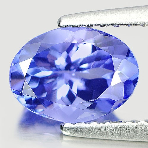 Natural Blue Tanzanite Gemstones 1.36 Ct. Oval Shape 8 x 6 Mm.: Product ID: 807008981 Product Name: Natural Tanzanite Weight: 1.36 CT. Size: 8 x 6 x 4.2 MM. Shape: Oval Color: Purple Clarity:VSI Luster: Very Good Gems Origin: Tanzania Treatment: Heated Crystal Str